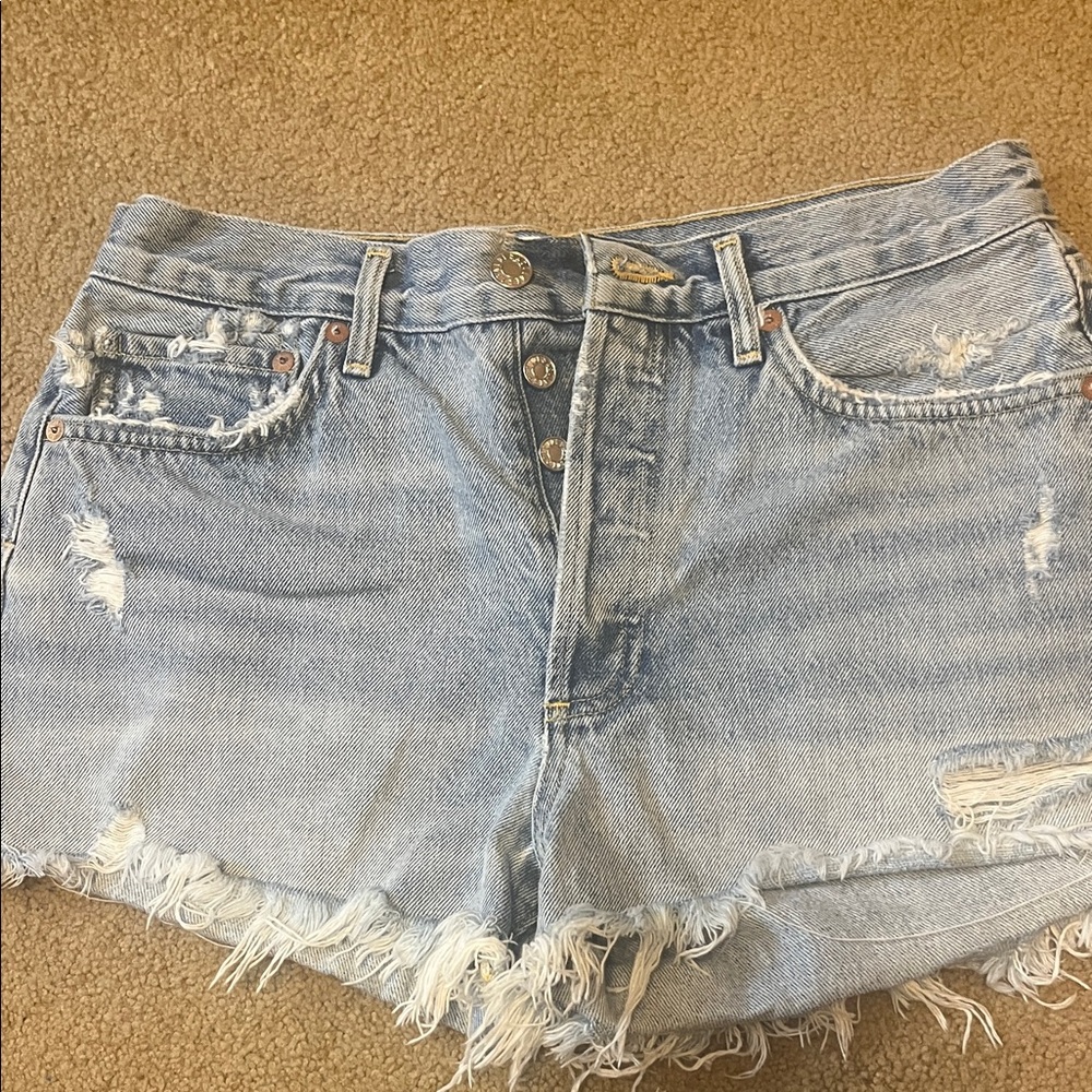 Agolde distressed light wash shorts